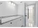 Bathroom with granite countertop and white cabinets at 549 Sun Ridge Pl # 104, Altamonte Springs, FL 32714