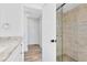 Bathroom with shower and granite vanity at 549 Sun Ridge Pl # 104, Altamonte Springs, FL 32714