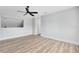 Second bedroom with wood-look floors and a ceiling fan at 549 Sun Ridge Pl # 104, Altamonte Springs, FL 32714