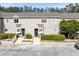 Two-story condo building with ample parking and landscaping at 549 Sun Ridge Pl # 104, Altamonte Springs, FL 32714