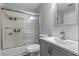 Updated bathroom with a tub, shower, and gray vanity at 605 Youngstown Pkwy # 32, Altamonte Springs, FL 32714