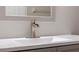 Modern bathroom vanity with sleek faucet and white sink at 605 Youngstown Pkwy # 32, Altamonte Springs, FL 32714