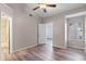 Spacious bedroom with wood-look floors and ensuite access at 605 Youngstown Pkwy # 32, Altamonte Springs, FL 32714