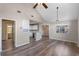 Living room with vaulted ceiling, fireplace, and laminate wood floors at 605 Youngstown Pkwy # 32, Altamonte Springs, FL 32714