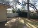 Partially shaded backyard with fenced area at 749 E Yorkshire Dr, Deland, FL 32724