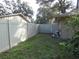 Backyard with privacy fence and grassy area at 749 E Yorkshire Dr, Deland, FL 32724