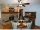 Dining room with brick fireplace and antique furniture at 749 E Yorkshire Dr, Deland, FL 32724