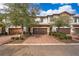 Modern townhome with stone accents and a two-car garage at 8545 Couples St, Davenport, FL 33896