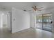 Living room with sliding glass doors to the backyard at 881 Kimball Dr, Ocoee, FL 34761