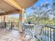 Relaxing balcony with patio furniture and scenic view at 910 Lotus Vista Dr # 201, Altamonte Springs, FL 32714