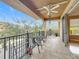 Private balcony with patio furniture and ceiling fan at 910 Lotus Vista Dr # 201, Altamonte Springs, FL 32714