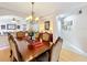 Elegant dining room with hardwood floors and a chandelier at 910 Lotus Vista Dr # 201, Altamonte Springs, FL 32714