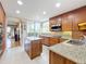 Modern kitchen with granite countertops, stainless steel appliances, and ample cabinetry at 910 Lotus Vista Dr # 201, Altamonte Springs, FL 32714