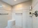 Walk-in shower with tiled walls and safety features at 910 Lotus Vista Dr # 201, Altamonte Springs, FL 32714