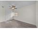 Spacious bedroom with ceiling fan and wood-look floors at 923 Ferndell Rd, Orlando, FL 32808