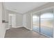 Light and airy dining area with sliding glass doors and wood-look floors at 923 Ferndell Rd, Orlando, FL 32808