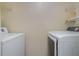 Bright laundry room, complete with washer and dryer at 95 Moonstone Ct, Port Orange, FL 32129