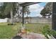 Spacious backyard with grassy area and plants at 962 Canary Lake Ct, Sanford, FL 32773