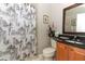 Bathroom with shower and granite vanity at 962 Canary Lake Ct, Sanford, FL 32773