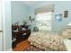 Bedroom with full-size bed and wood floors at 962 Canary Lake Ct, Sanford, FL 32773