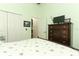 Bedroom with double bed, dresser, and closet at 962 Canary Lake Ct, Sanford, FL 32773