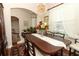 Dining room with a wood table and chandelier at 962 Canary Lake Ct, Sanford, FL 32773