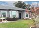 House exterior with a dark brown door and landscaping at 962 Canary Lake Ct, Sanford, FL 32773