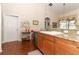 Bright kitchen with granite countertops and stainless steel dishwasher at 962 Canary Lake Ct, Sanford, FL 32773