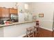 Kitchen with stainless steel appliances and granite counters at 962 Canary Lake Ct, Sanford, FL 32773