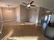 Open living room and dining area with tile floors at 1073 Kelly Creek Cir, Oviedo, FL 32765