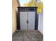 Large storage shed with double doors in the backyard at 1073 Kelly Creek Cir, Oviedo, FL 32765