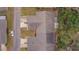 Top-down view of condo building highlighting roofline and landscaping at 10738 Se 50Th Ave, Belleview, FL 34420