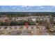 Wide aerial view of the condo and its surroundings at 10738 Se 50Th Ave, Belleview, FL 34420