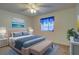 Bedroom with a king-size bed and decor at 10738 Se 50Th Ave, Belleview, FL 34420