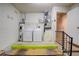Laundry room with washer, dryer, and additional storage at 10738 Se 50Th Ave, Belleview, FL 34420