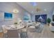Living room features wood floors, a ceiling fan, and stylish furniture at 10738 Se 50Th Ave, Belleview, FL 34420