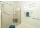 Large walk-in shower with tiled walls and seat at 1108 S Palmetto Ave, Sanford, FL 32771