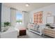 Bedroom with crib and calming decor at 11175 Rising Sun St, Orlando, FL 32829