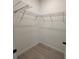 Well-organized closet featuring corner shelving, maximizing storage space for an efficient layout at 13188 Sw Sw 65Th Cir, Ocala, FL 34473