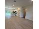 Open-concept kitchen with modern appliances and a stylish island with ample counter space at 13188 Sw Sw 65Th Cir, Ocala, FL 34473