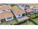 Backyard view of home with patio and fenced yard at 13567 Abberwick Dr, Orlando, FL 32832