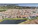 Aerial view of community showing home location by lake at 13567 Abberwick Dr, Orlando, FL 32832