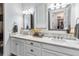 Bright bathroom boasts double vanity, ample counter space, and a walk-in shower at 13567 Abberwick Dr, Orlando, FL 32832