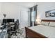 Bedroom with a desk, gaming chair and a double bed at 13567 Abberwick Dr, Orlando, FL 32832