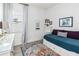Charming bedroom with a day bed, dresser, and large window at 13567 Abberwick Dr, Orlando, FL 32832
