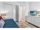 Guest bedroom with a twin bed, dresser and access to a bathroom at 13567 Abberwick Dr, Orlando, FL 32832