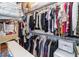 Large walk-in closet with ample shelving and hanging space at 13567 Abberwick Dr, Orlando, FL 32832