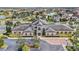 Community center with a large parking lot and landscaping at 13567 Abberwick Dr, Orlando, FL 32832