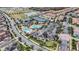 Aerial view of community pool, tennis courts, and clubhouse at 13567 Abberwick Dr, Orlando, FL 32832