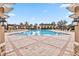 Resort-style community pool with plenty of lounge chairs at 13567 Abberwick Dr, Orlando, FL 32832
